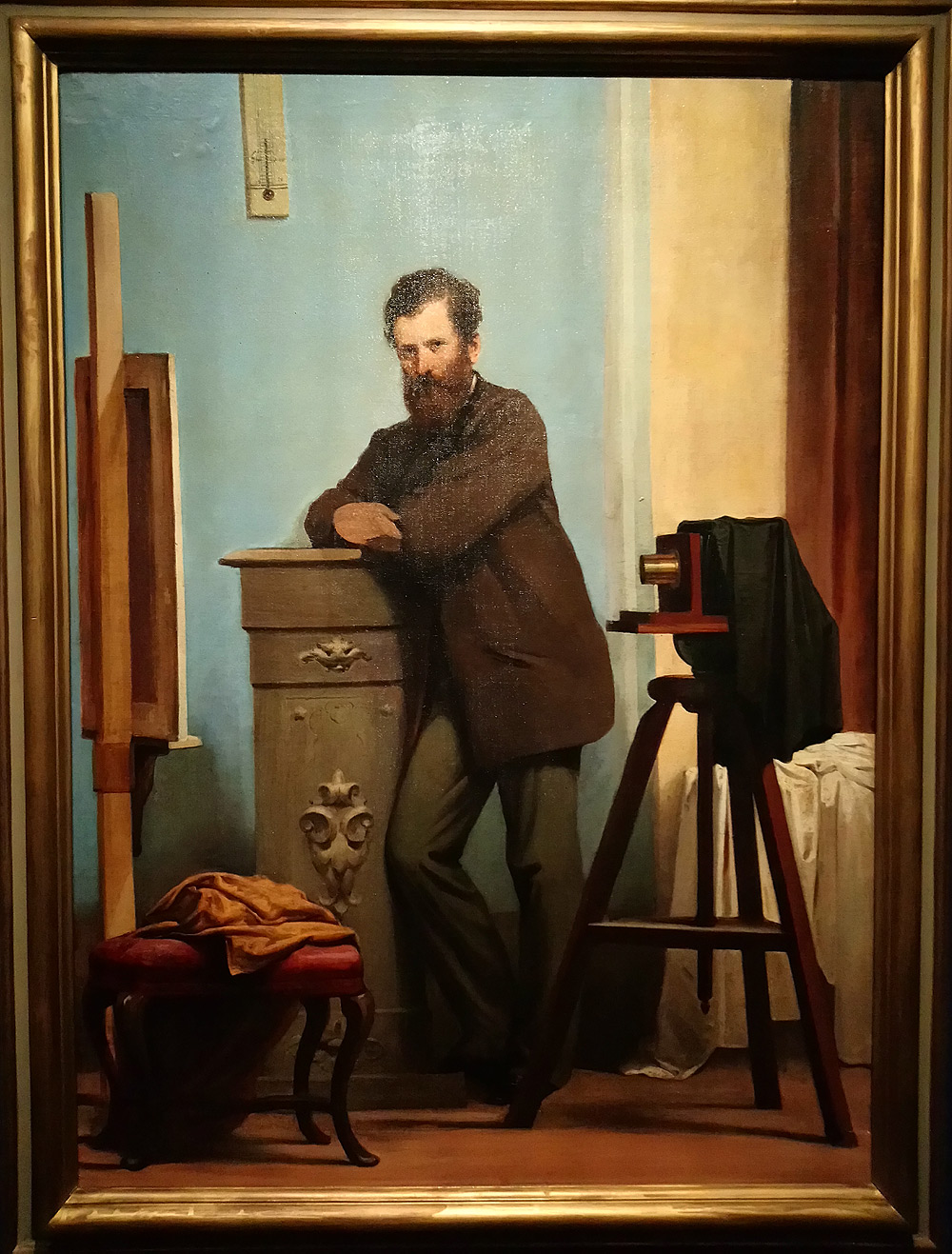 Alessandro Guardassoni, Autoritratto con macchina fotografica (1855-1860; olio su tela, 125 x 92 x 7,5 cm; Bologna, Fondazione Gualandi a Favore dei Sordi) 