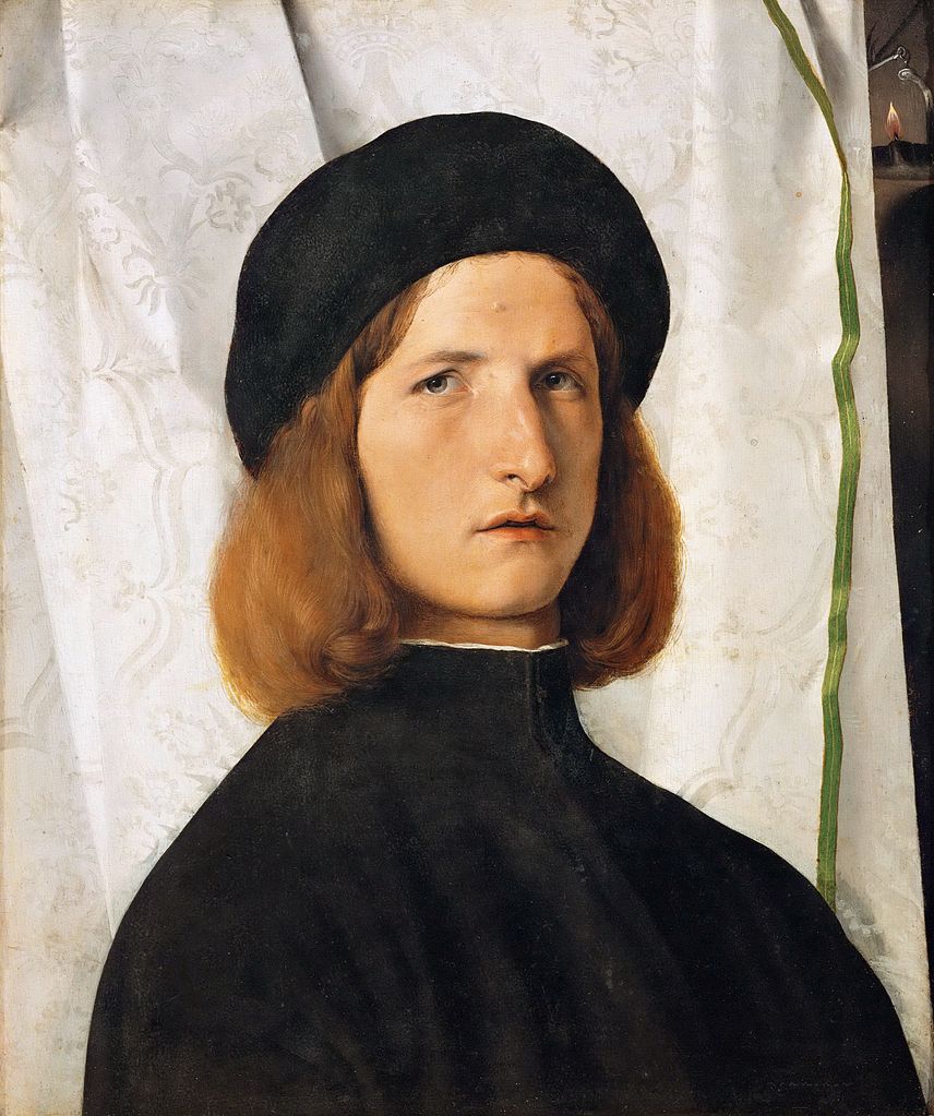 Lorenzo Lotto, Giovane con lucerna (1506 circa; olio su tavola, 42,3 x 35,3 cm; Vienna, Kunsthistorisches Museum)

