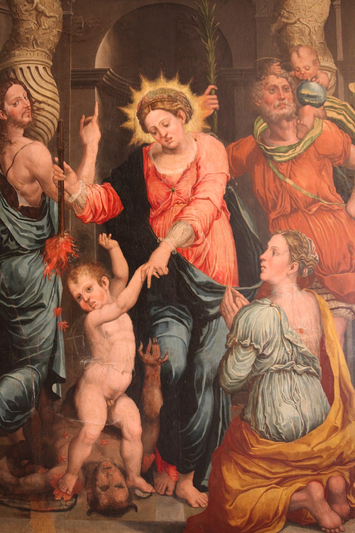 Raffaellino del Colle, Madonna del Soccorso tra san Giovanni Battista e san Cristoforo (1536 circa; olio su tavola, 223 x 145 cm; Urbino, Galleria Nazionale delle Marche) 