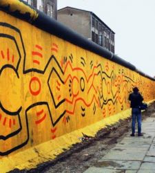 When Keith Haring was painting on the Berlin Wall.