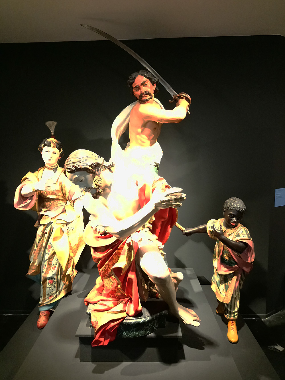 Marco Antonio Poggio, Decollazione di san Giovanni Battista (1660-1665 circa; legno, scolpito, dipinto e dorato, occhi in pasta vitrea, 290 x 193 x 300 cm; Genova, Sestri Ponente, Oratorio Morte e Orazione)
