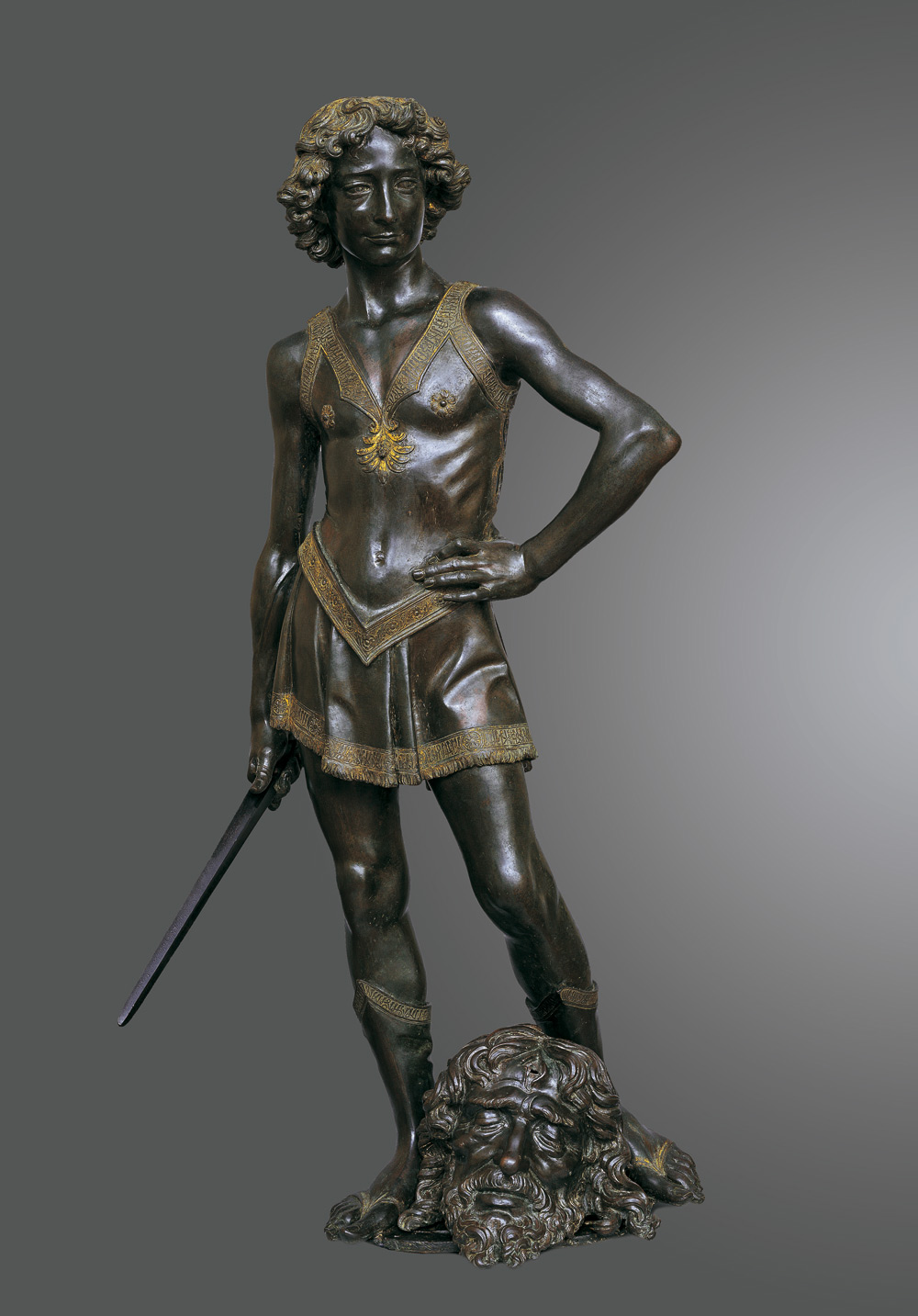 Andrea del Verrocchio, David vittorioso (1468-1470 circa; bronzo con tracce di dorature, 122 x 60 x 58 cm; Firenze, Museo Nazionale del Bargello)