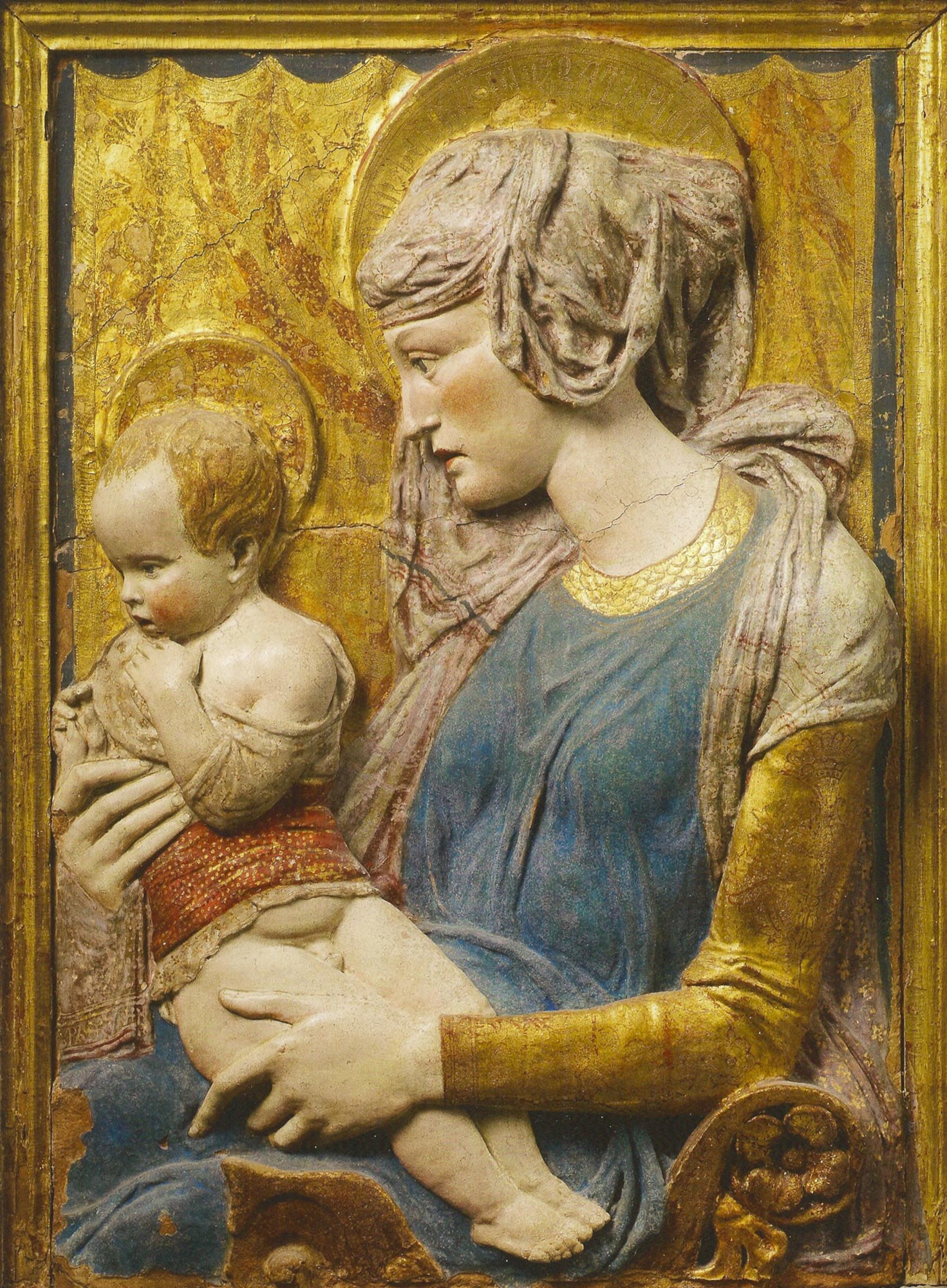 Donatello, Madonna col Bambino (Madonna Vettori) (terracotta policroma e dorata, 102 x 74 cm; Parigi, Louvre)
