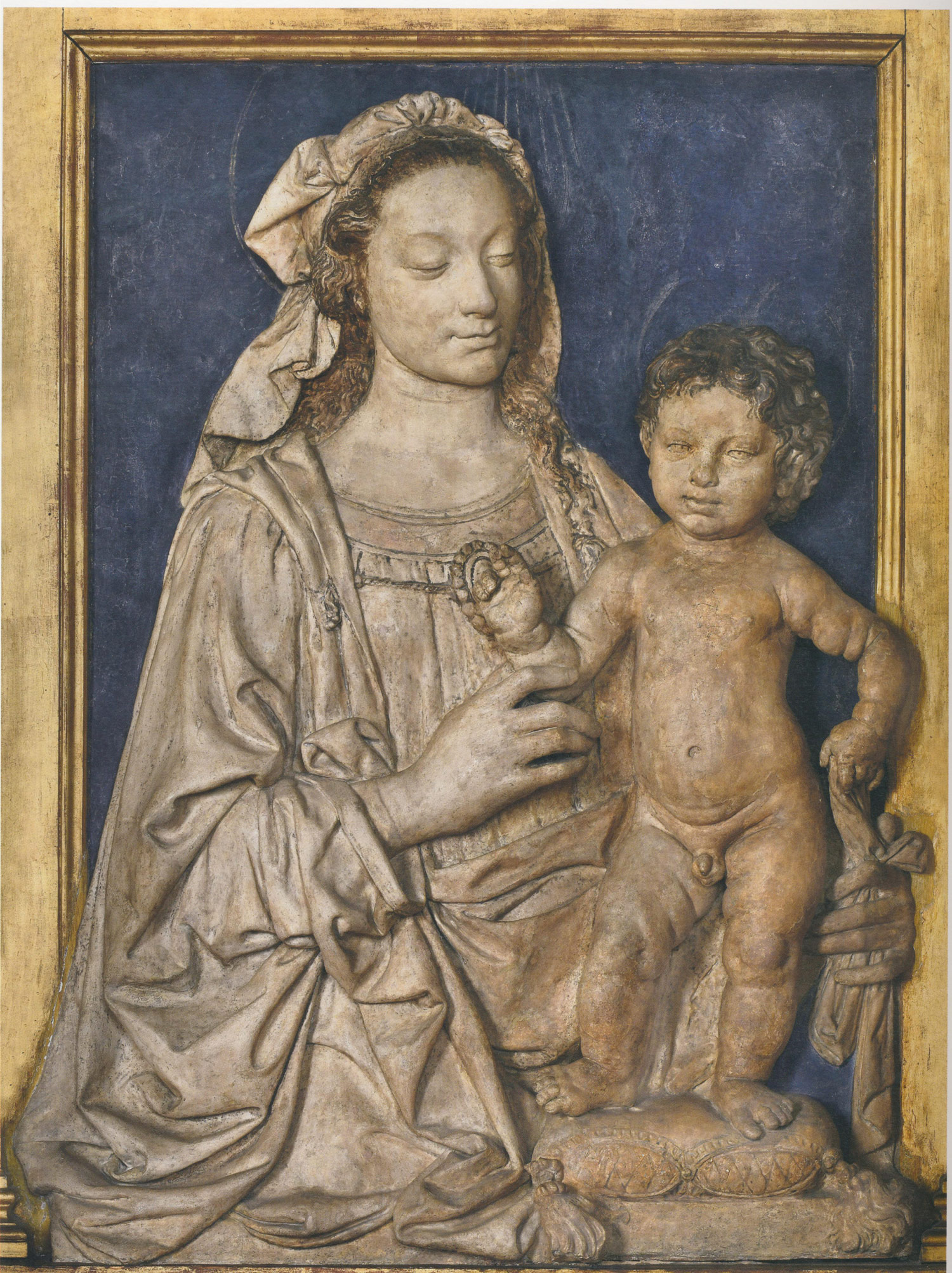 Andrea del Verrocchio, Madonna col Bambino benedicente (1470 circa; terracotta, 87 x 67 cm;. Firenze, Museo Nazionale del Bargello)
