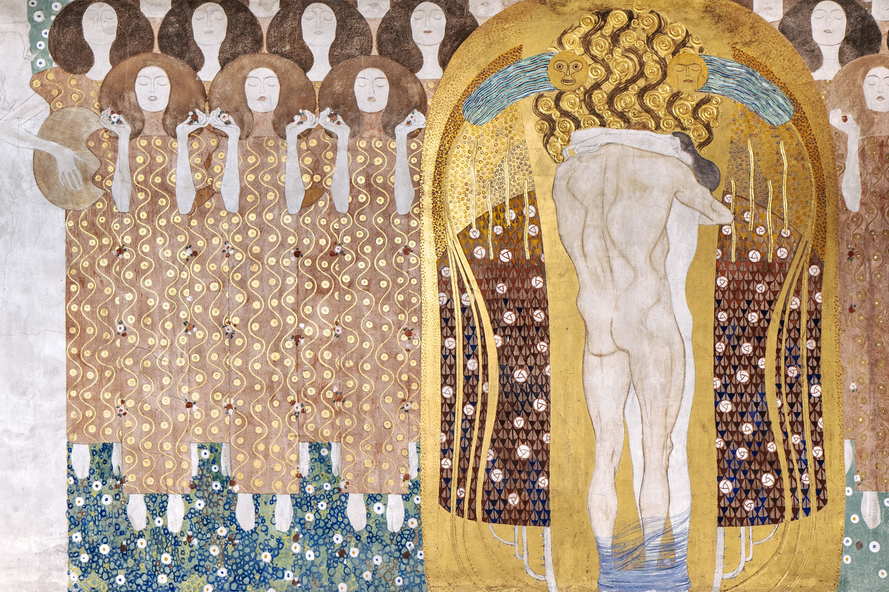 Gustav Klimt, Kuss der ganzen Welt, dettaglio del Beethovenfries (1902; caseina su stucco; Vienna, Palazzo della Secessione)
