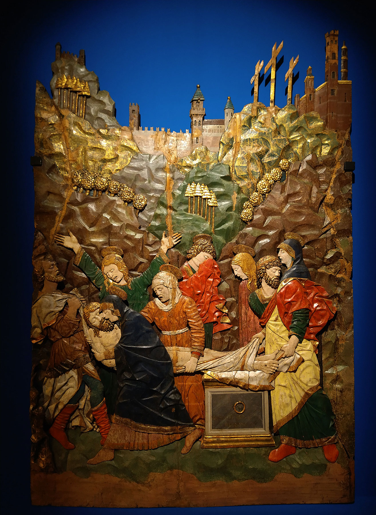 Giacomo del Maino e Benrardino Butinone, Deposizione di Cristo nel sepolcro (1476-1482; legno intagliato, dorato e policromato, 181 x 121 x 6 cm; Milano, Castello Sforzesco, Civiche Raccolte d'Arte Applicata)
