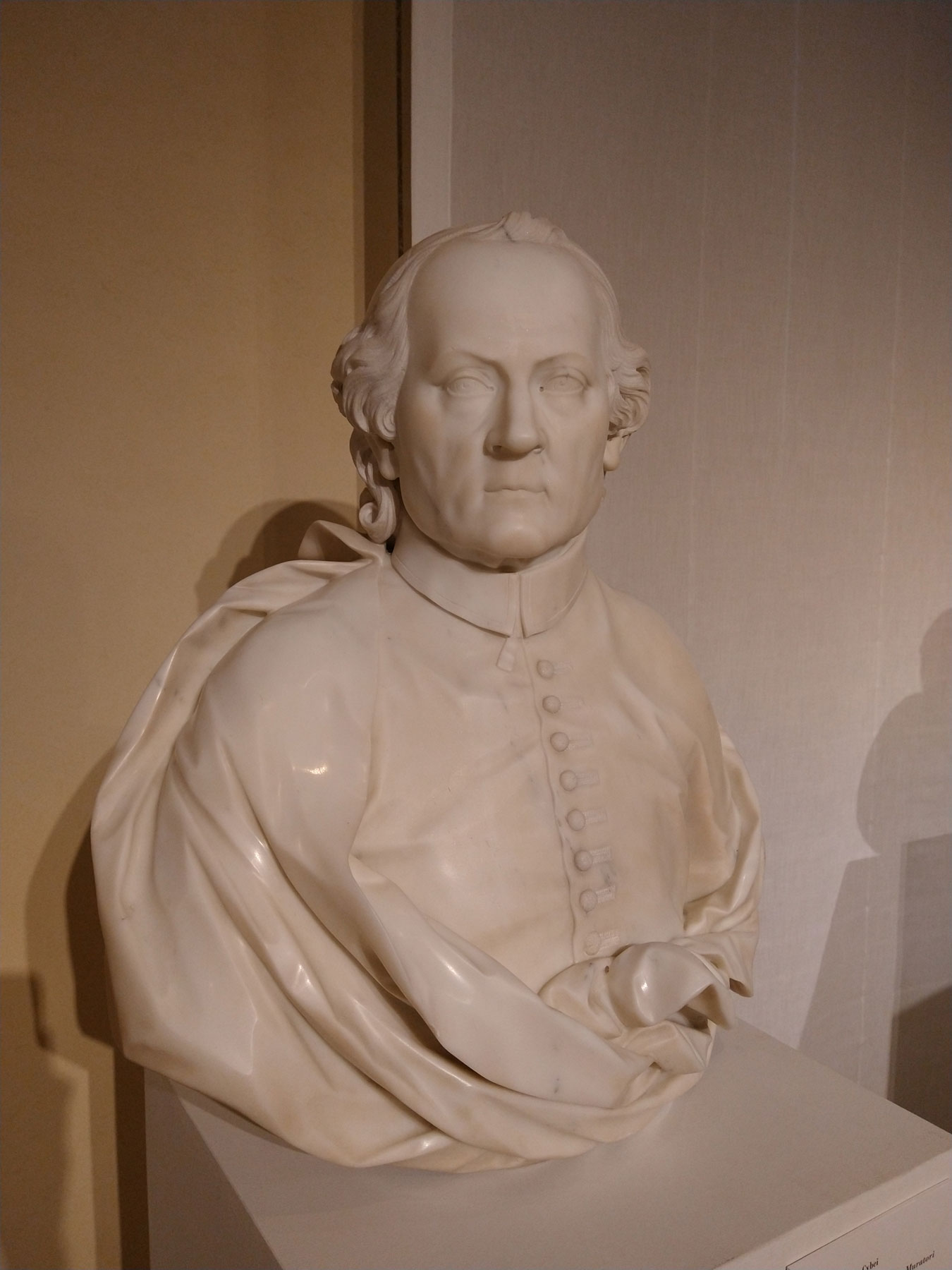 Giovanni Antonio Cybei, Ritratto di Ludovico Antonio Muratori (1774; busto in marmo statuario, base in nero Marquina, 93 x 66 x 36 cm; Modena, Biblioteca Estense Universitaria)
 Giovanni Antonio Cybei, Ritratto di Ludovico Antonio Muratori (1774; busto in marmo statuario, base in nero Marquina, 93 x 66 x 36 cm; Modena, Biblioteca Estense Universitaria)