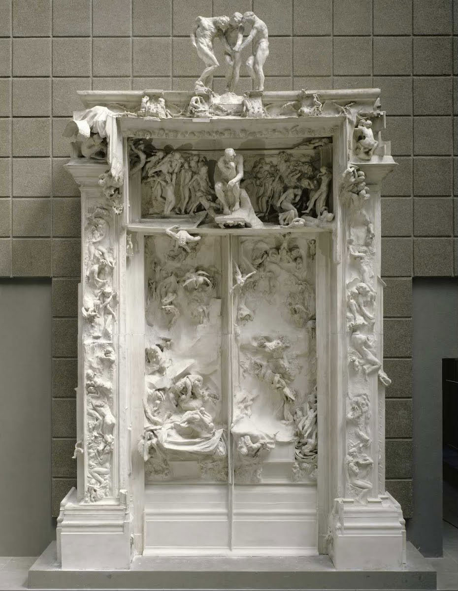 Auguste Rodin, La Porte de l’Enfer [La porta dell’Inferno] ([1880-1917], calco in gesso del 1989 in due parti, 298 x 399 x 122 cm parte bassa, 312 x 374 x 135 cm parte alta, altezza totale 610 cm; Parigi, Musée Rodin, inv. E33)
