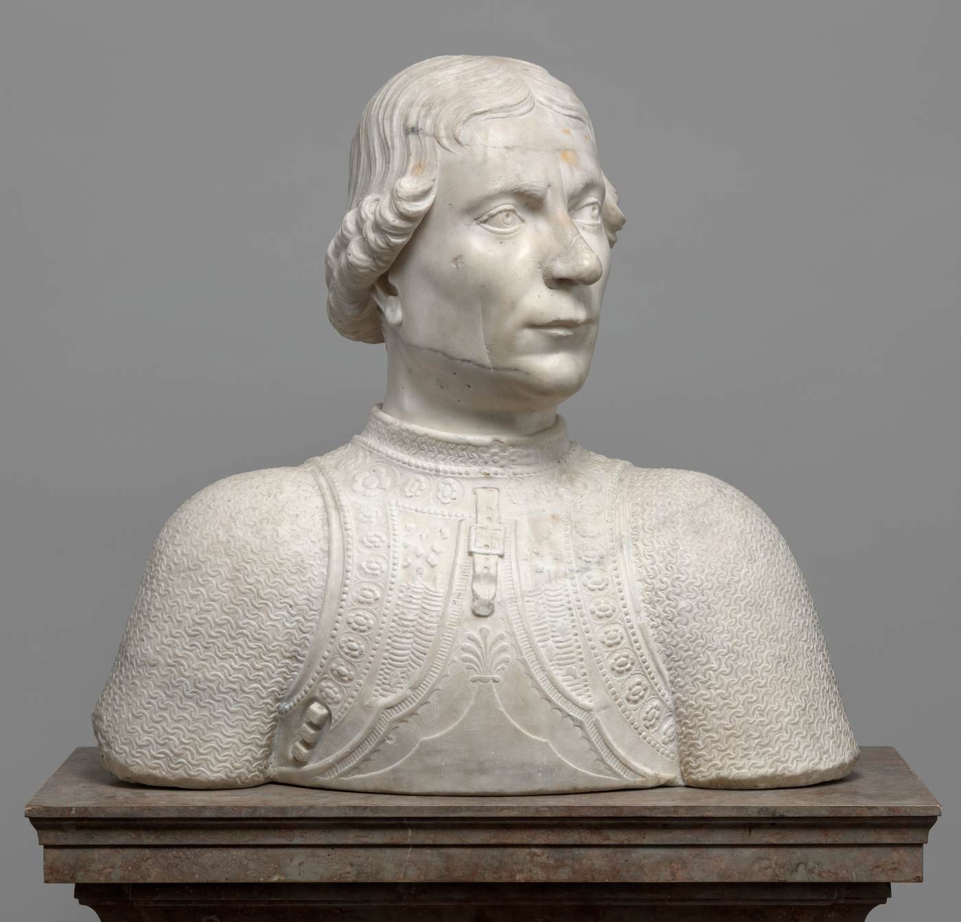 Mino da Fiesole, Ritratto di Astorre Manfredi (1455; marmo, 52 x 54 x 28 cm; Washington, National Gallery of Art)
