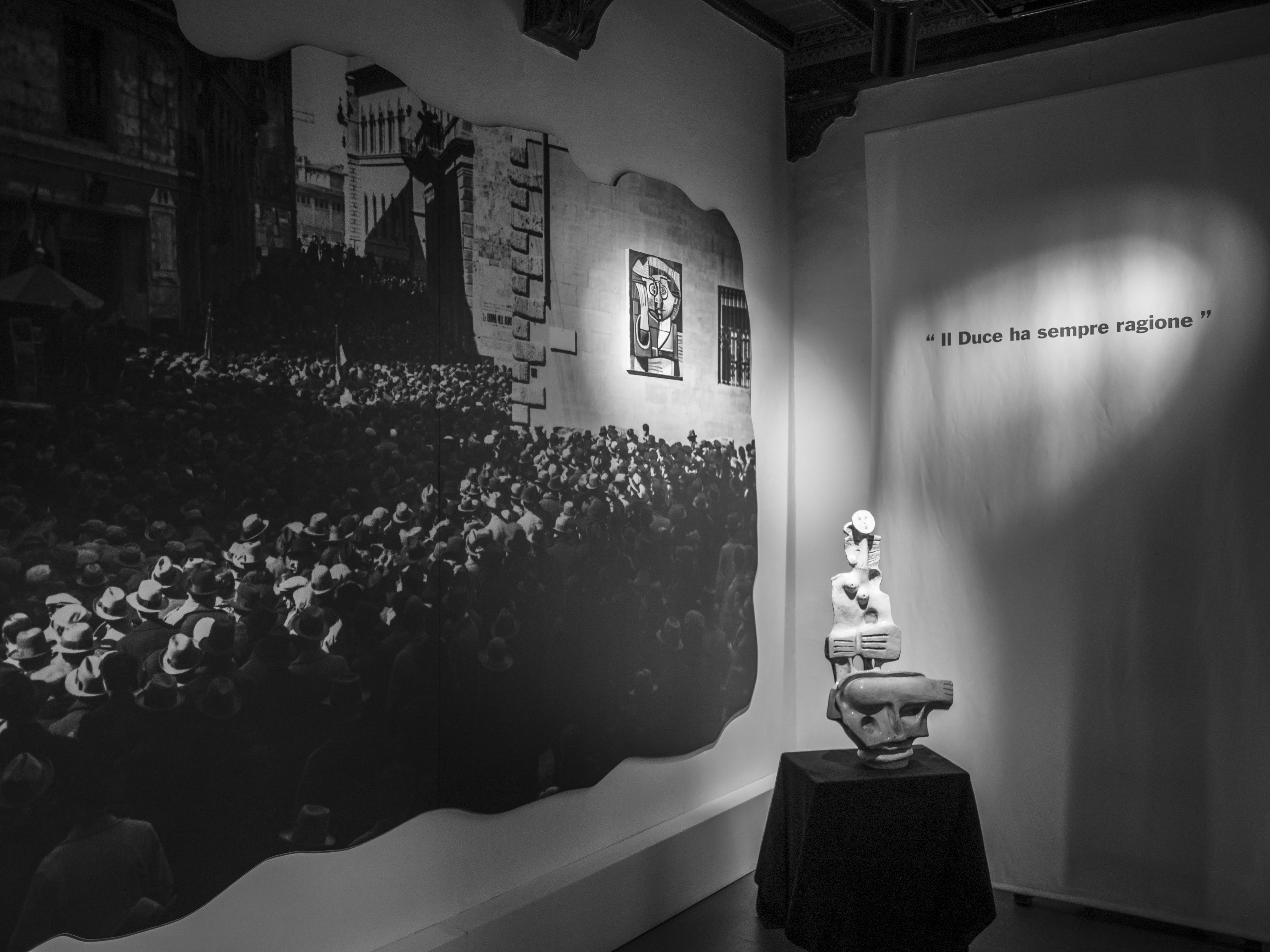 Siena, Rooms of Memory. Photograph of a gathering at the Casa del Fascio.