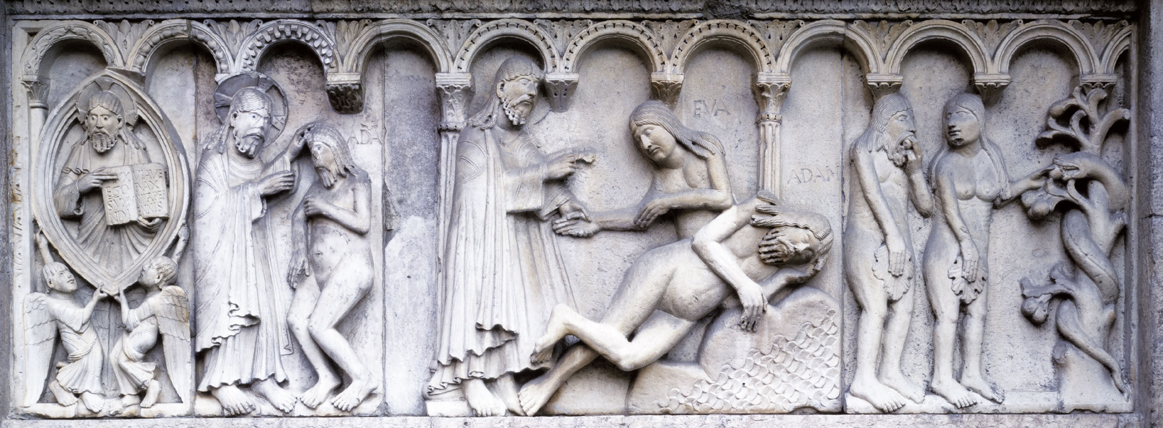 Wiligelmo, Stories from Genesis: the All-Father in the Almond, the Creation of Adam, the Creation of Eve, Original Sin (c. 1099-1110; Vicenza soft stone; Modena, Duomo). Photo: Museums of the Cathedral of Modena