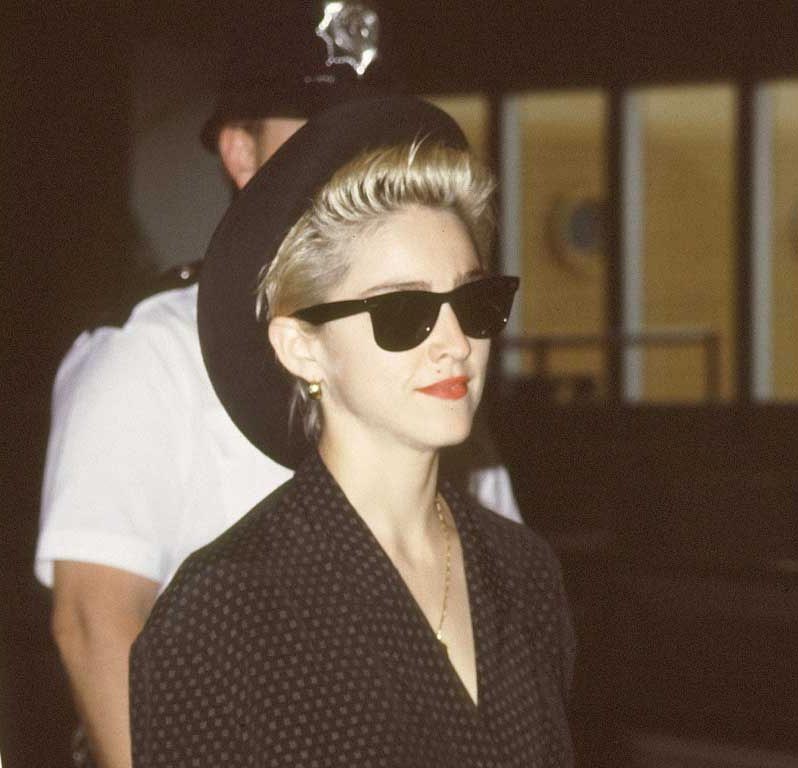 Madonna wears a pair of Wayfarer