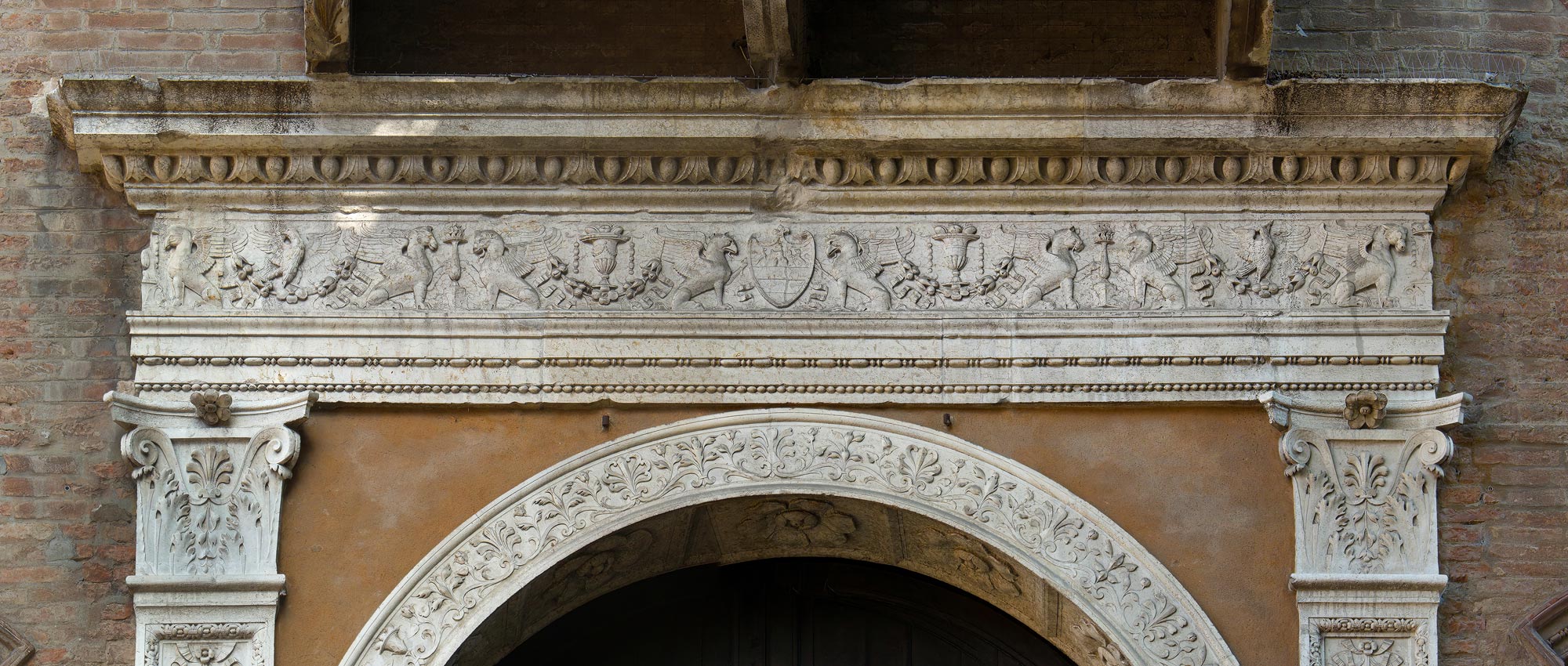The frieze carved into the entablature.