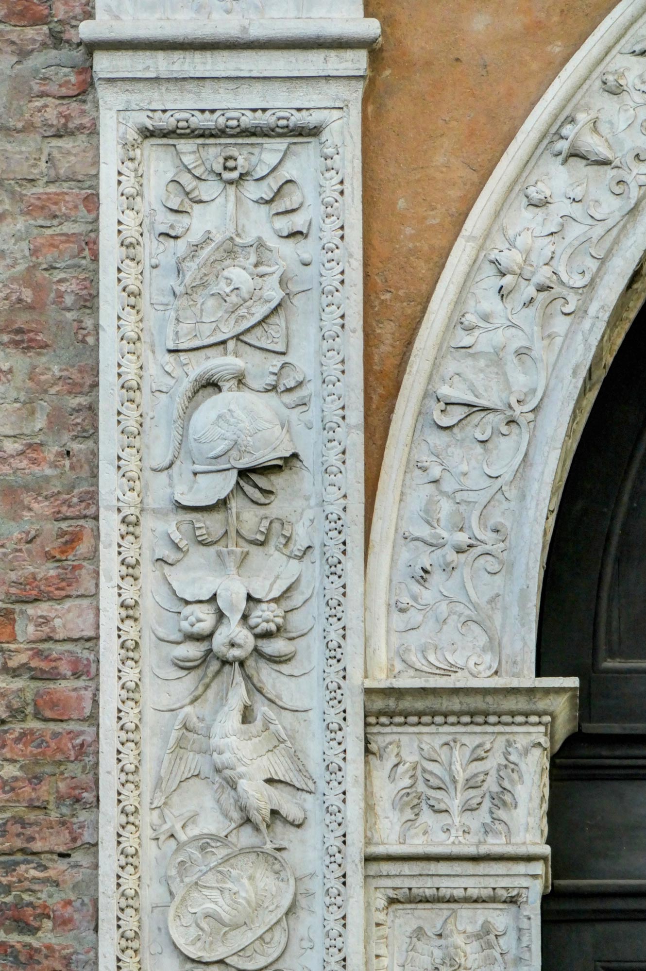 Detail of the left side of the Portal of the Princes' Palace in Correggio (1507).
