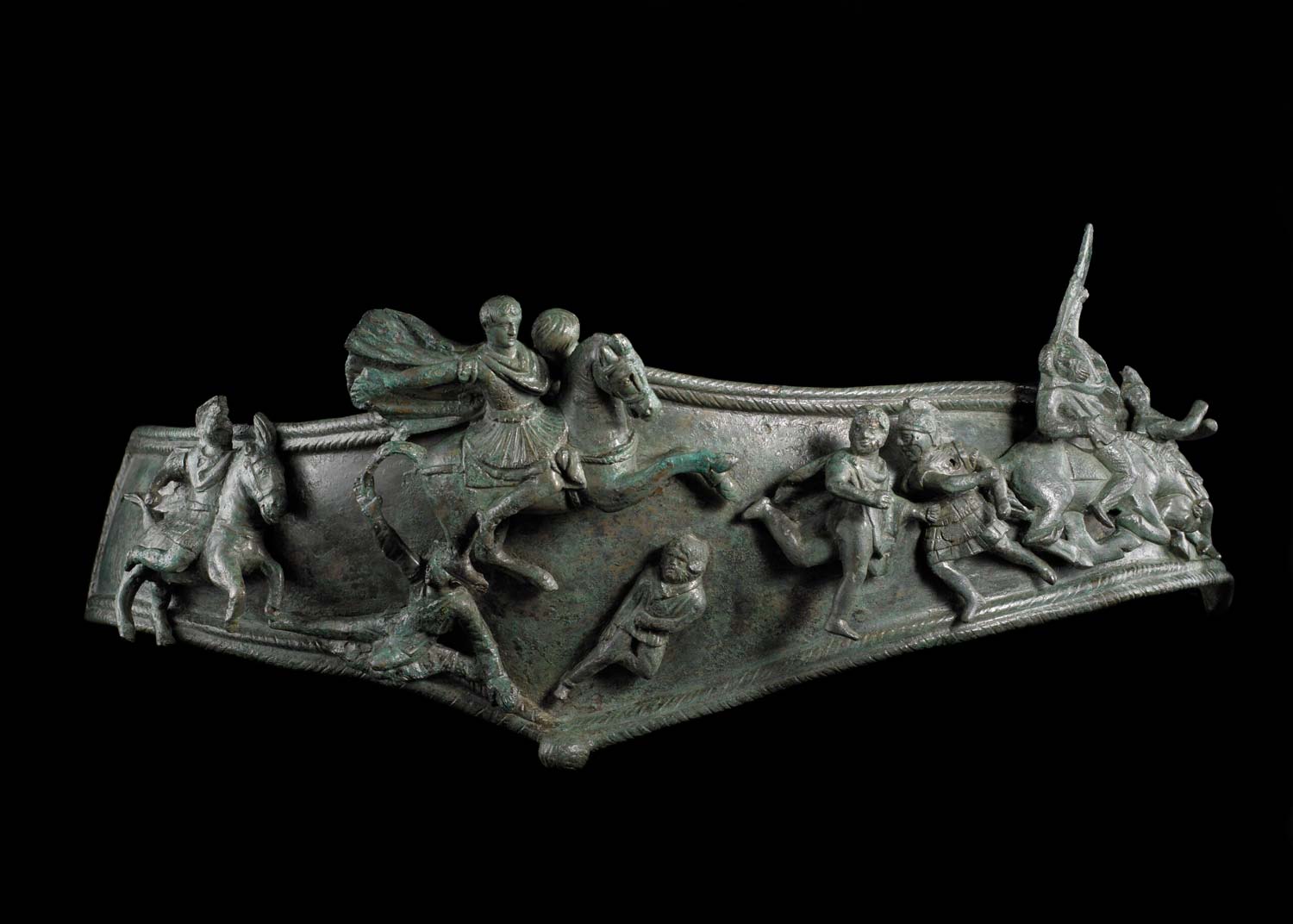 Pettorale da cavallo di statua equestre con scena di battaglia fra Romani e barbari, bronzo, I-II secolo d.C., area del Capitolium, scavi 1826, Archivio Fotografico Musei Brescia, Fotostudio Rapuzzi Pettorale da cavallo di statua equestre con scena di battaglia fra Romani e barbari, bronzo, I-II secolo d.C., area del Capitolium, scavi 1826, Archivio Fotografico Musei Brescia, Fotostudio Rapuzzi