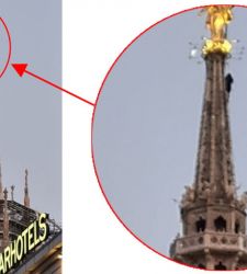 Milano, scalano all'alba la guglia maggiore del Duomo di Milano, quasi fino alla Madonnina