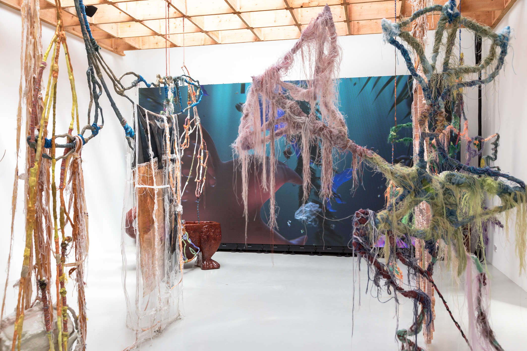 Julien Creuzet, Attila cataracte ta source aux pieds des pitons verts finira dans la grande mer gouffre bleu nous noyâmes dans les larmes marées de la lune (2024). Venice Biennale, 60th edition, Pavilion of France. Photo: Marco Zorzanello
