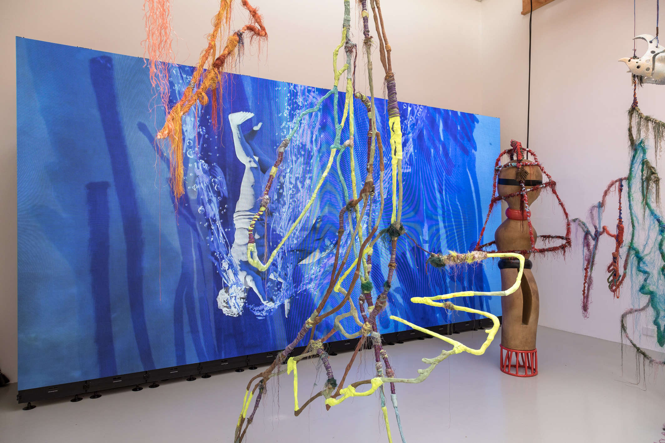 Julien Creuzet, Attila cataracte ta source aux pieds des pitons verts finira dans la grande mer gouffre bleu nous noyâmes dans les larmes marées de la lune (2024). Venice Biennale, 60th edition, Pavilion of France. Photo: Marco Zorzanello