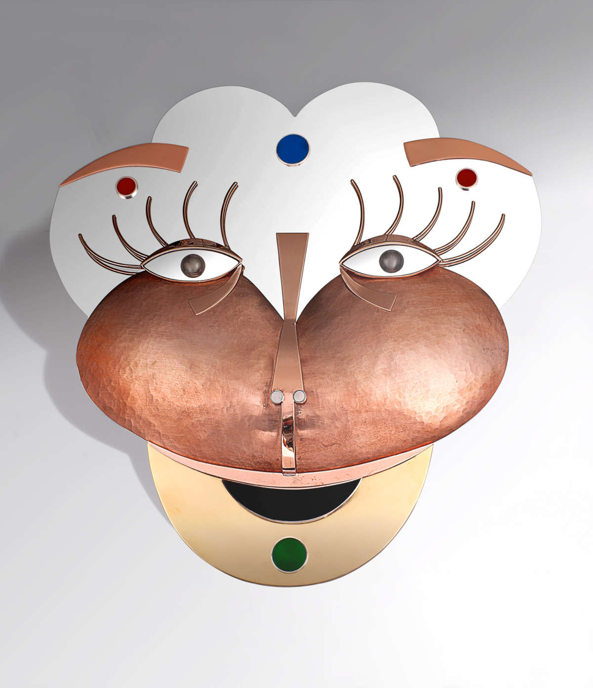 Alessandro Mendini, Futurist Masks: Boccioni (2018; metal and enamel mask, 31 x 6 x 33 cm, Argenteria Pampaloni Florence) Alessandro Mendini Archive