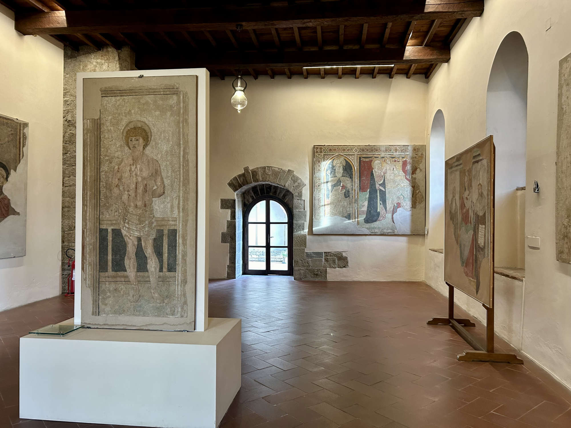 The museum room on the upper floor with frescoes and sinopites