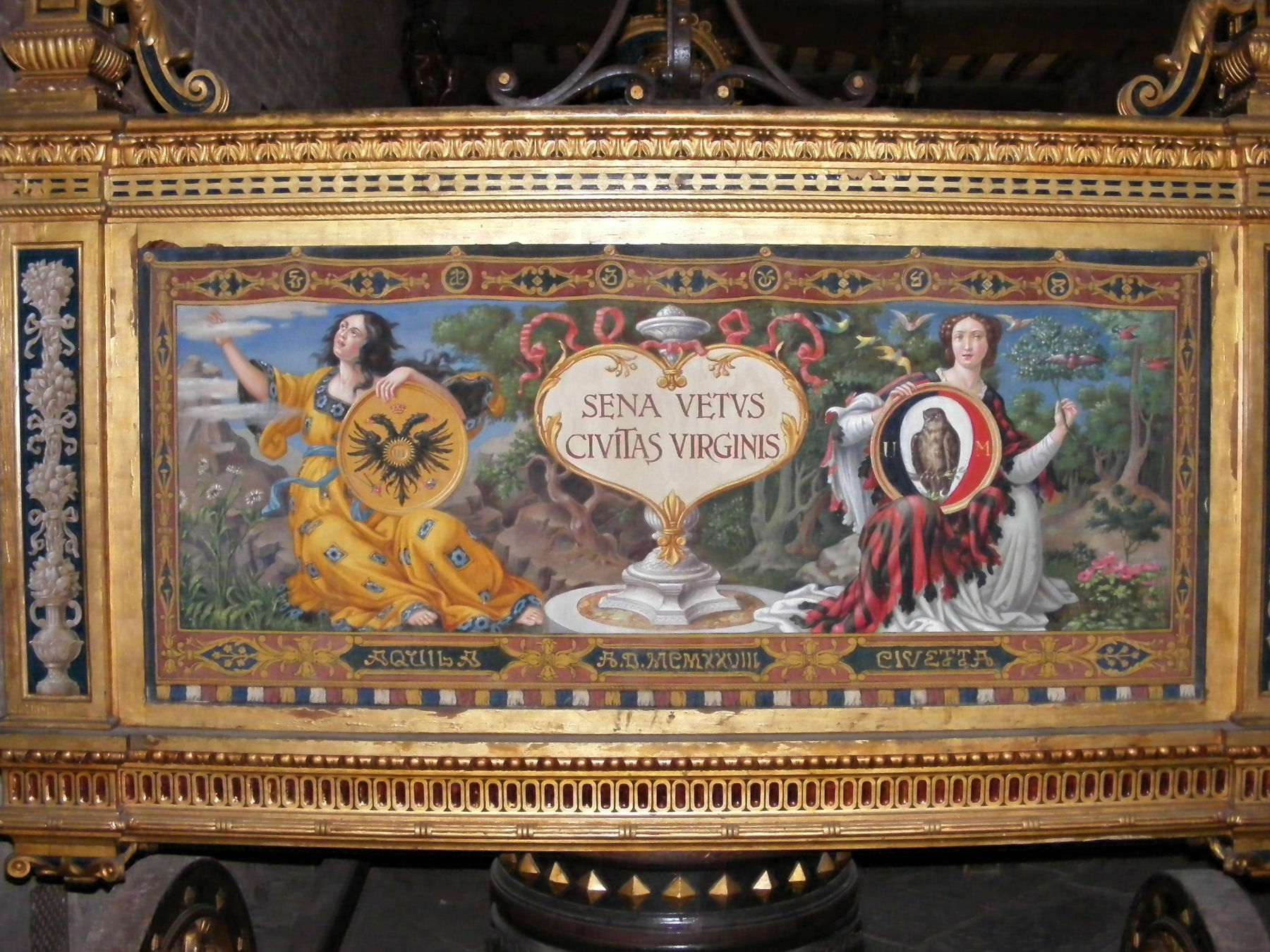 Voiture peinte avec les armoiries de la Contrade di Siena, l'aigle à gauche et la chouette à droite. Sienne, complexe muséal de Santa Maria della Scala. Photo : Wikimedia Commons - Rabe !