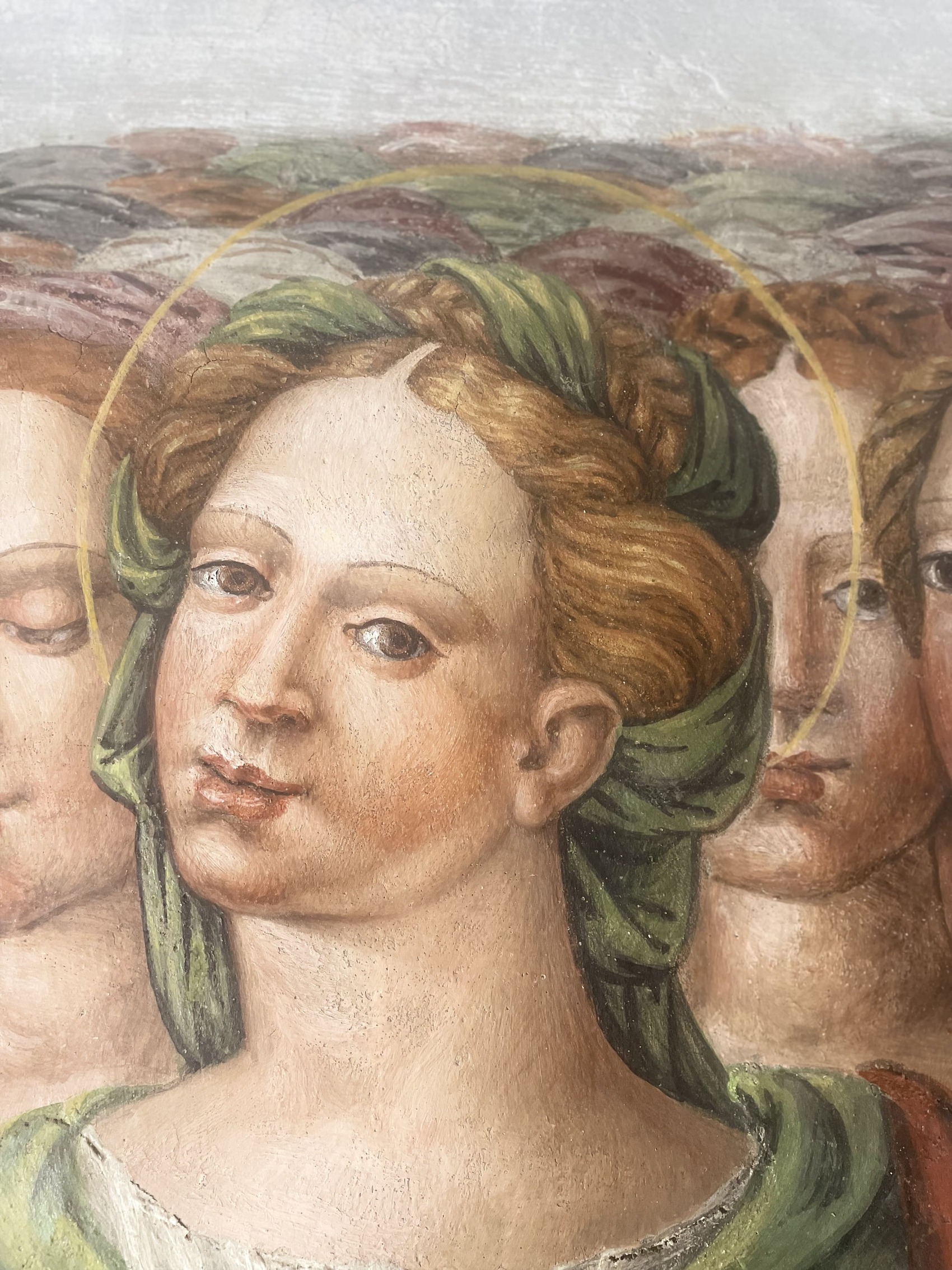 Detail of the face of one of the Virgin Martyrs, after restoration.
