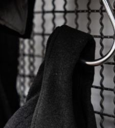 Jannis Kounellis on display at 10 Corso Como in Milan with installation of seventy coats