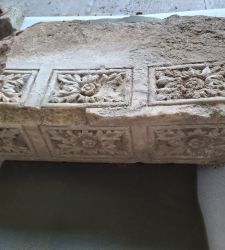 A visitor stumbles upon a decorated stone artifact in Monza Park, along the Lambro River