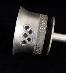Auctioning a rare 1956 Cortina Olympic flashlight, symbolic bridge to Milan Cortina 2026